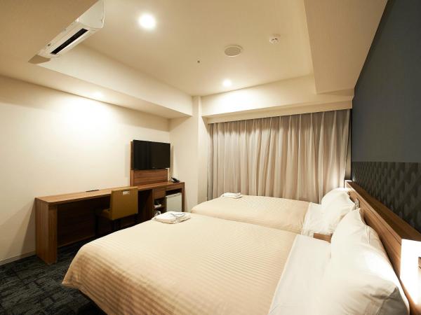 Sotetsu Fresa Inn Kitahama : photo 1 de la chambre chambre lits jumeaux deluxe