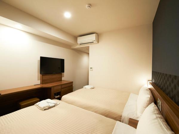 Sotetsu Fresa Inn Kitahama : photo 2 de la chambre chambre lits jumeaux standard