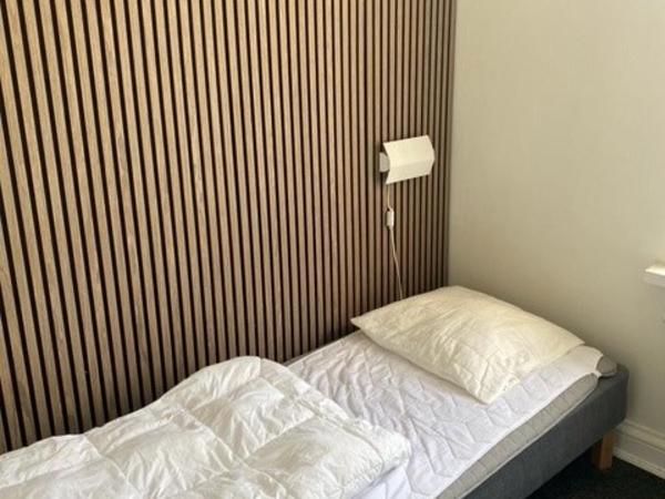 Danhostel Odense City : photo 6 de la chambre chambre triple avec salle de bains privative