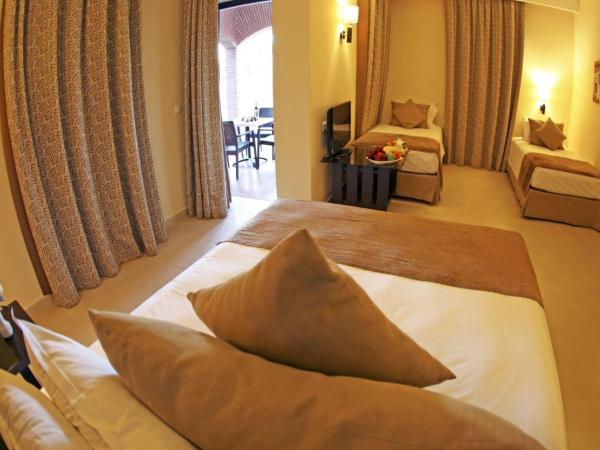 Labranda Targa Aqua Parc : photo 5 de la chambre chambre familiale - vue sur jardin