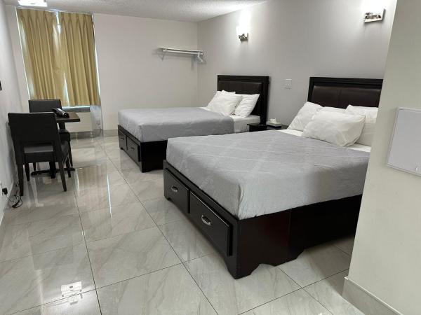Diplomat Inn : photo 4 de la chambre chambre supérieure 2 lits queen-size - récemment rénovée