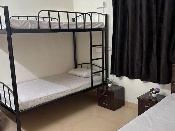 Elite stays : photo 1 de la chambre chambre lits jumeaux avec salle de bains privative