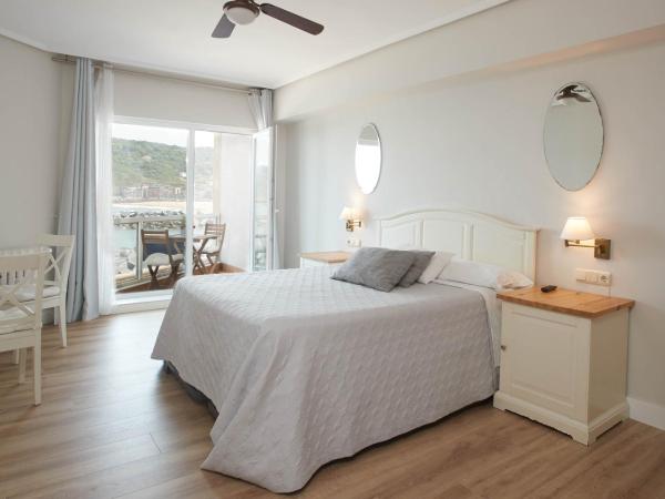 Pensión Itxasoa : photo 2 de la chambre chambre quadruple avec balcon