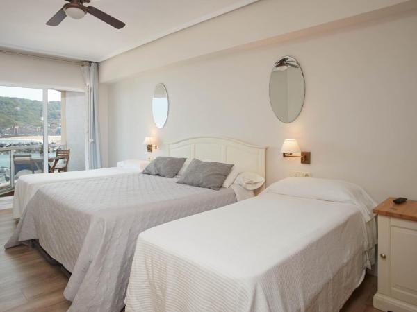 Pensión Itxasoa : photo 3 de la chambre chambre quadruple avec balcon