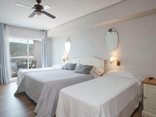 Pensión Itxasoa : photo 1 de la chambre chambre quadruple avec balcon