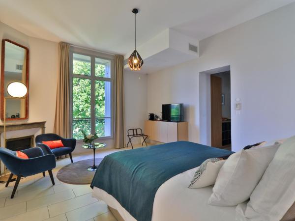 Villa Meridia : photo 9 de la chambre chambre lit queen-size - vue sur jardin