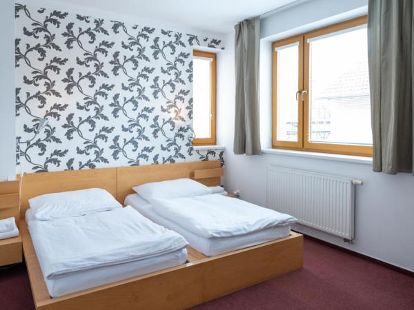 Hotel Garni Pod Skalkou : photo 7 de la chambre chambre lits jumeaux