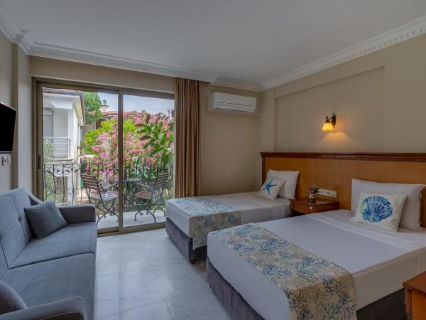 Rosy Suites Hotel : photo 2 de la chambre studio avec vue sur jardin