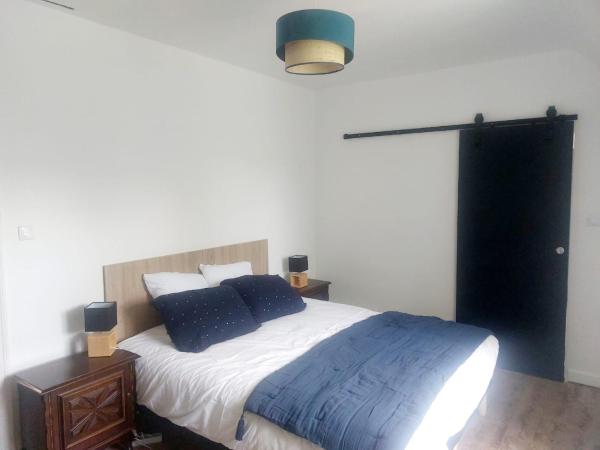 L'échappée, Chambres et Tables d'hôtes : photo 4 de la chambre chambre double - vue sur jardin