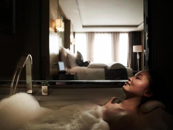 Pullman Wuxi New Lake : photo 3 de la chambre chambre lit king-size deluxe