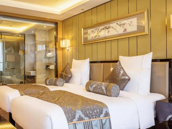 Pullman Wuxi New Lake : photo 2 de la chambre chambre lits jumeaux avec accès au salon exécutif