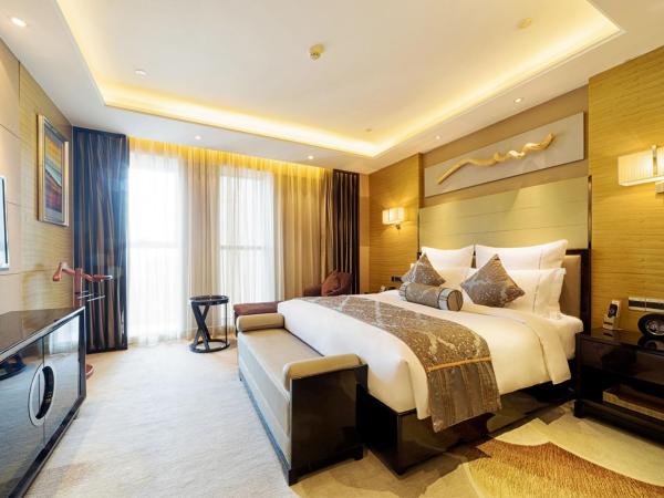 Pullman Wuxi New Lake : photo 3 de la chambre suite supérieure avec accès au salon exécutif