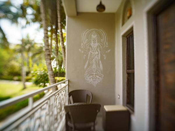 Breathing Earth - Rooms and Pool : photo 9 de la chambre chambre deluxe