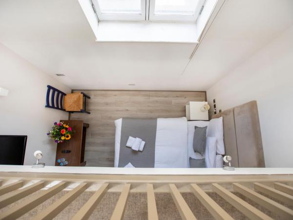 Arch Hotel : photo 2 de la chambre appartement duplex (4 adultes)