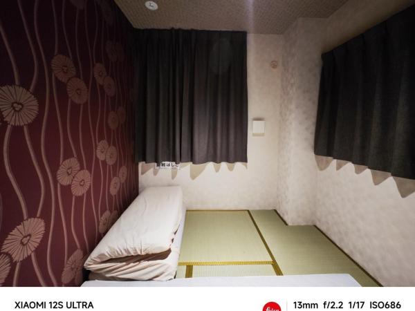 2023年6月開業 サカエ ゲストハウス : photo 2 de la chambre chambre lits jumeaux avec toilettes communes