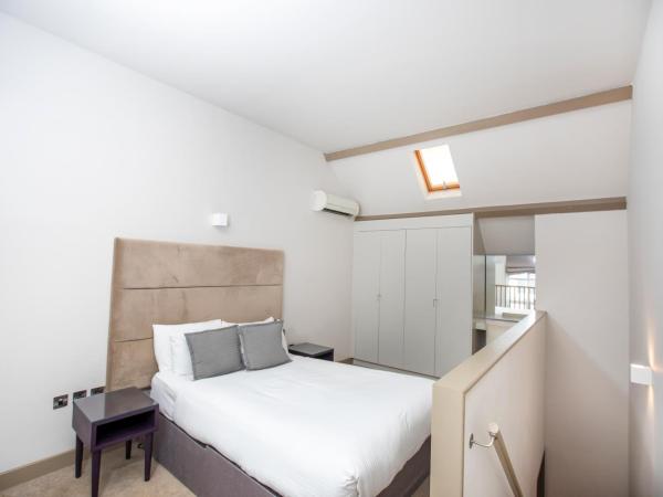 Arch Hotel : photo 3 de la chambre appartement duplex (4 adultes)