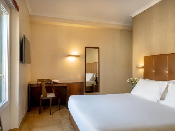 UNAHOTELS Galles Milano : photo 1 de la chambre suite avec canapé-lit