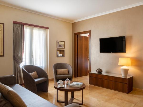 UNAHOTELS Galles Milano : photo 2 de la chambre suite avec canapé-lit