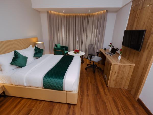 Travancore Court : photo 1 de la chambre chambre lit king-size deluxe