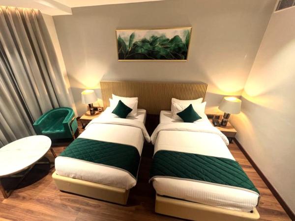 Travancore Court : photo 6 de la chambre chambre lits jumeaux deluxe