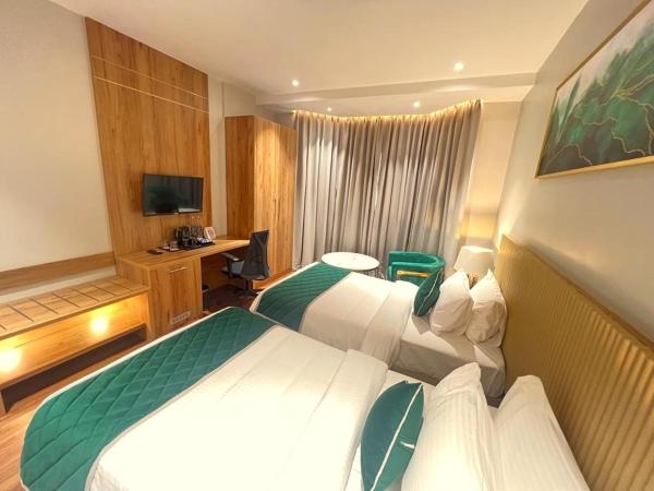 Travancore Court : photo 5 de la chambre chambre lits jumeaux deluxe