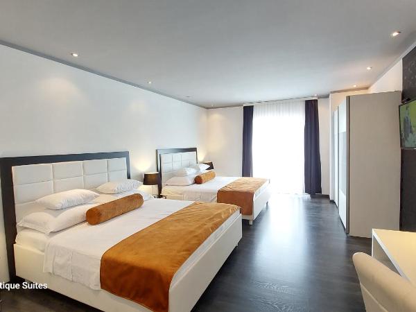 Refresh Boutique Suites - Central Point : photo 3 de la chambre suite supérieure lit king-size
