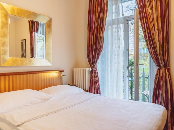 Art Deco Hotel Montana Luzern : photo 1 de la chambre chambre lit queen-size