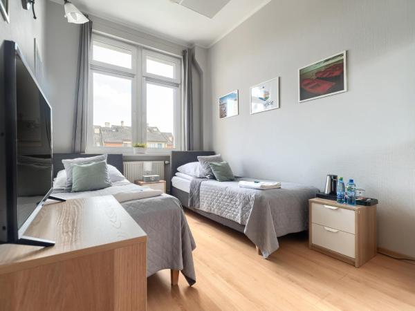 Stawa Apart Hostel : photo 1 de la chambre pokój z 2 łóżkami pojedyńczymi i wspólną łazienką na korytarzu