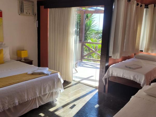 Pousada Vila do Sol : photo 2 de la chambre chambre quadruple - vue sur mer