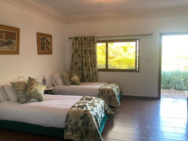 Riad Hamdani : photo 1 de la chambre chambre triple - vue sur jardin
