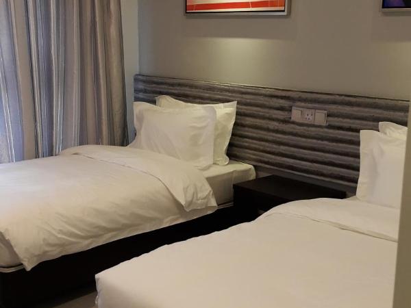 M Design Hotel @ Shamelin Perkasa : photo 5 de la chambre chambre lits jumeaux deluxe