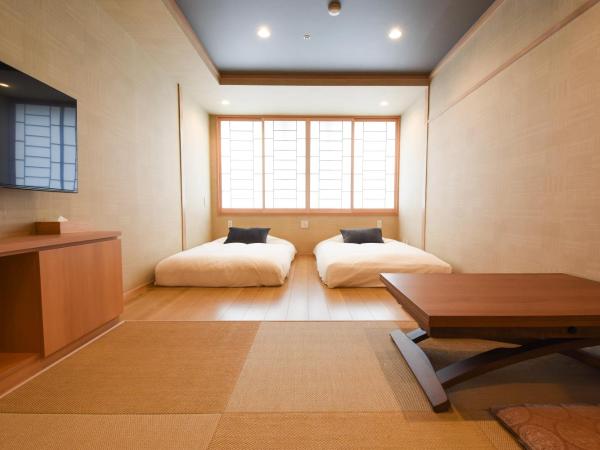 Hotel Isago Kobe : photo 1 de la chambre chambre triple supérieure