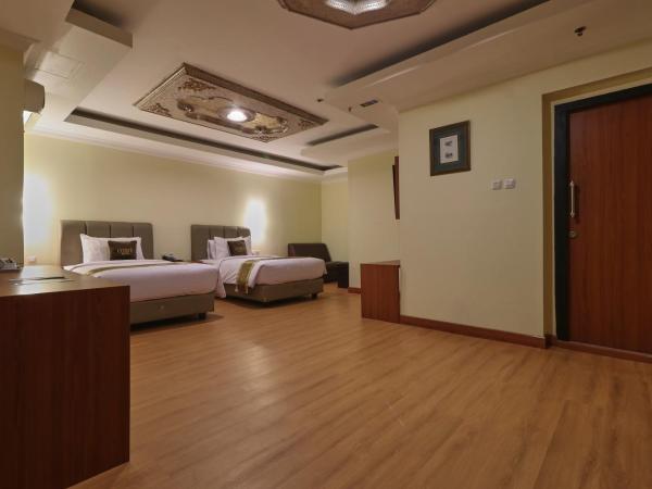 Coins Hotel Jakarta : photo 7 de la chambre grande chambre double 