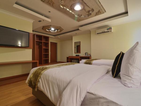 Coins Hotel Jakarta : photo 9 de la chambre grande chambre double 