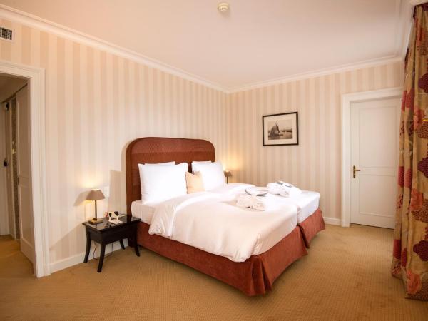 Hôtel Des Trois Couronnes & Spa - The Leading Hotels of the World : photo 1 de la chambre chambre double exécutive - vue latérale sur lac