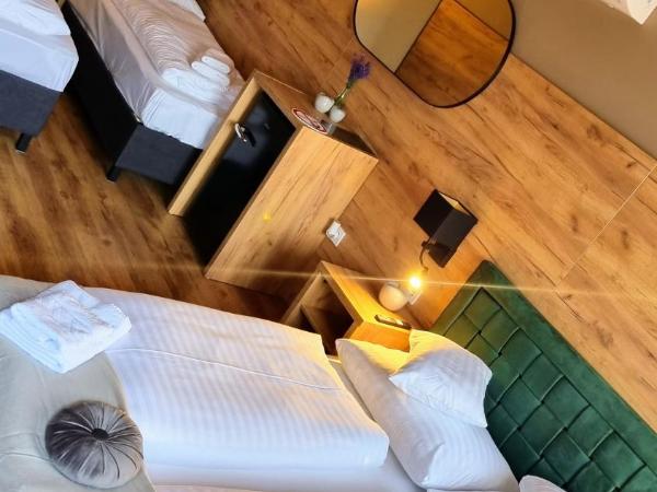 Boutique Hotel & Event Center : photo 1 de la chambre chambre quadruple standard