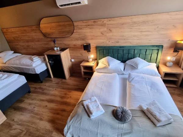 Boutique Hotel & Event Center : photo 2 de la chambre chambre quadruple standard