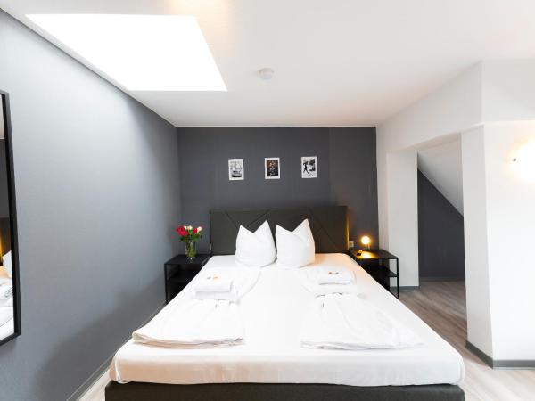 Hotel Astoria am Urachplatz : photo 5 de la chambre appartement