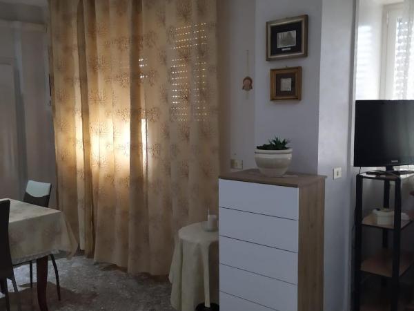 Paky's House : photo 10 de la chambre chambre quadruple - vue sur jardin