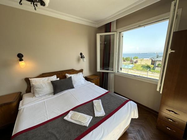 Queen Seagull Boutique Hotel : photo 7 de la chambre chambre lit king-size avec balcon