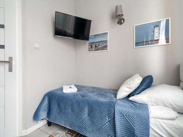 Stawa Apart Hostel : photo 4 de la chambre chambre lits jumeaux avec salle de bains privative