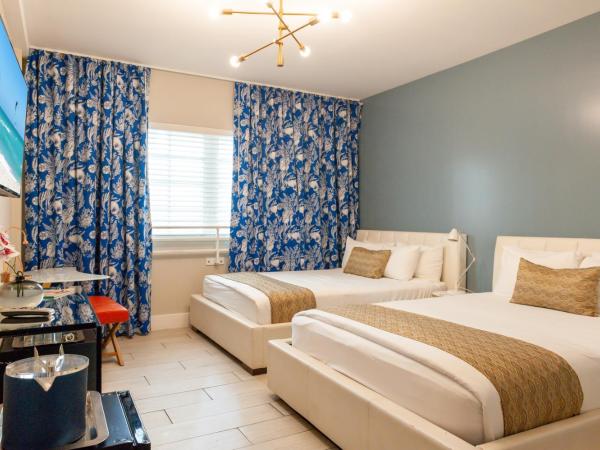 Oceanside Hotel and Suites : photo 9 de la chambre chambre lit queen-size 
