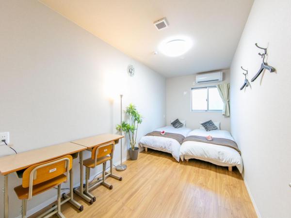 GUEST House彩 : photo 2 de la chambre chambre lits jumeaux avec salle de bains commune