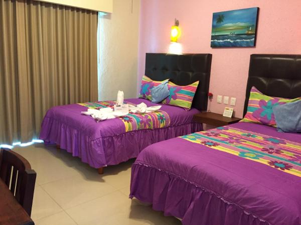 Hotel Isleño : photo 3 de la chambre chambre double ou lits jumeaux standard avec balcon