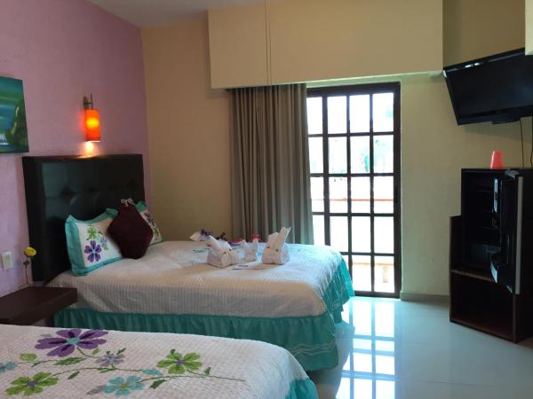 Hotel Isleño : photo 7 de la chambre chambre double premium avec balcon