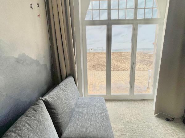 Hotel Zhong Hua : photo 6 de la chambre chambre lit king-size - vue sur mer