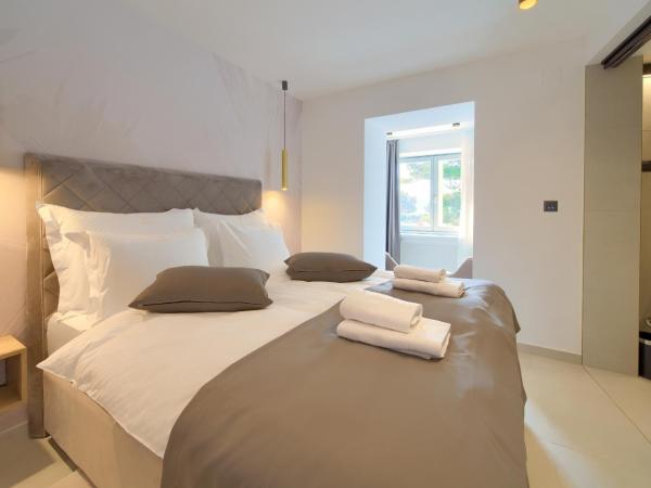 Portella Rooms : photo 5 de la chambre chambre double deluxe - vue sur mer