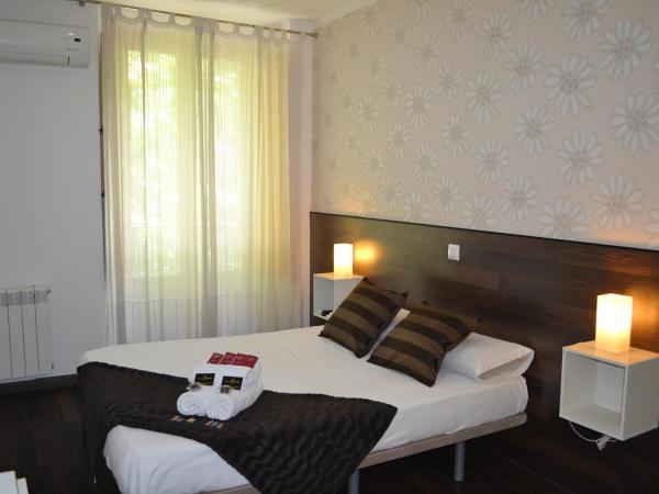 Hostal El Brezo : photo 4 de la chambre chambre double – vue sur ville