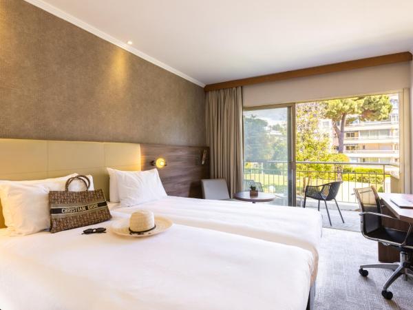 Luxotel Cannes : photo 1 de la chambre chambre lits jumeaux privilège avec vue sur jardin