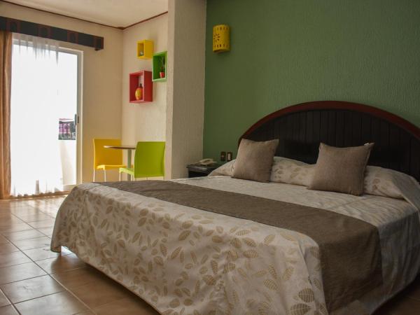 Suites Los Arcos : photo 8 de la chambre chambre lit king-size